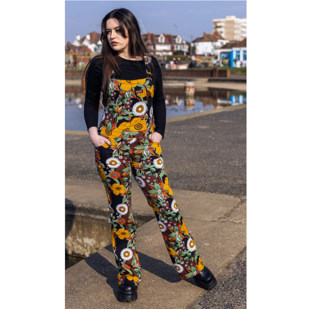 Run & Fly - Floral Skinny Flared Latzhose - Schwarz